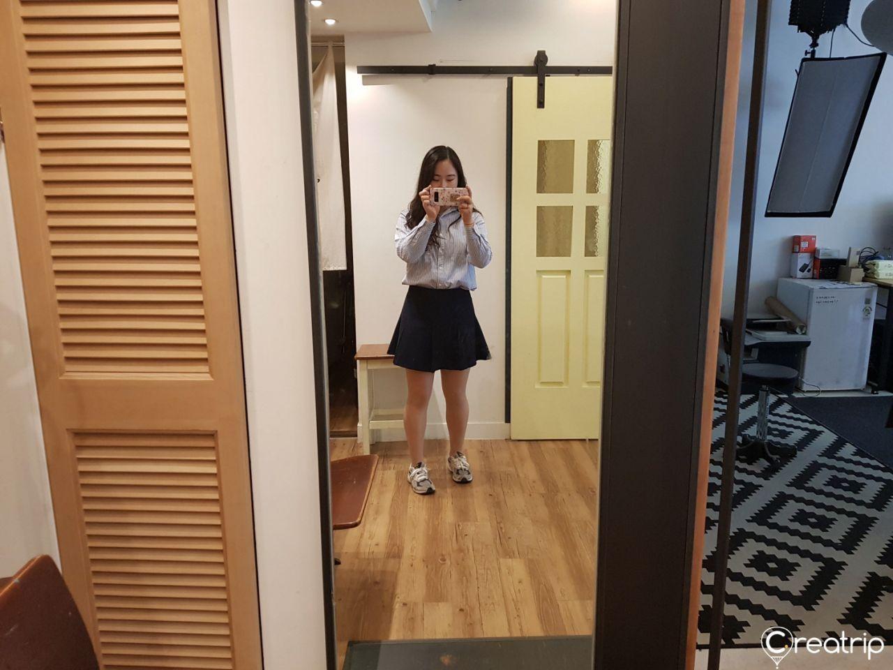 Interior of Fork Studio showing large mirror designated for photo shoots.