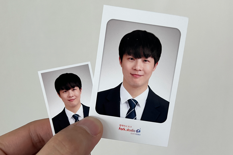 Sample Korean passport photo taken at Fork Studio in Ewha, showcasing professional photography and editing skills.