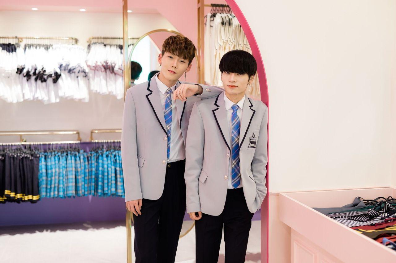 Detailed view of school uniforms available for rent at Ehwa School Uniform, showcasing quality fabric and design against a vibrant backdrop.