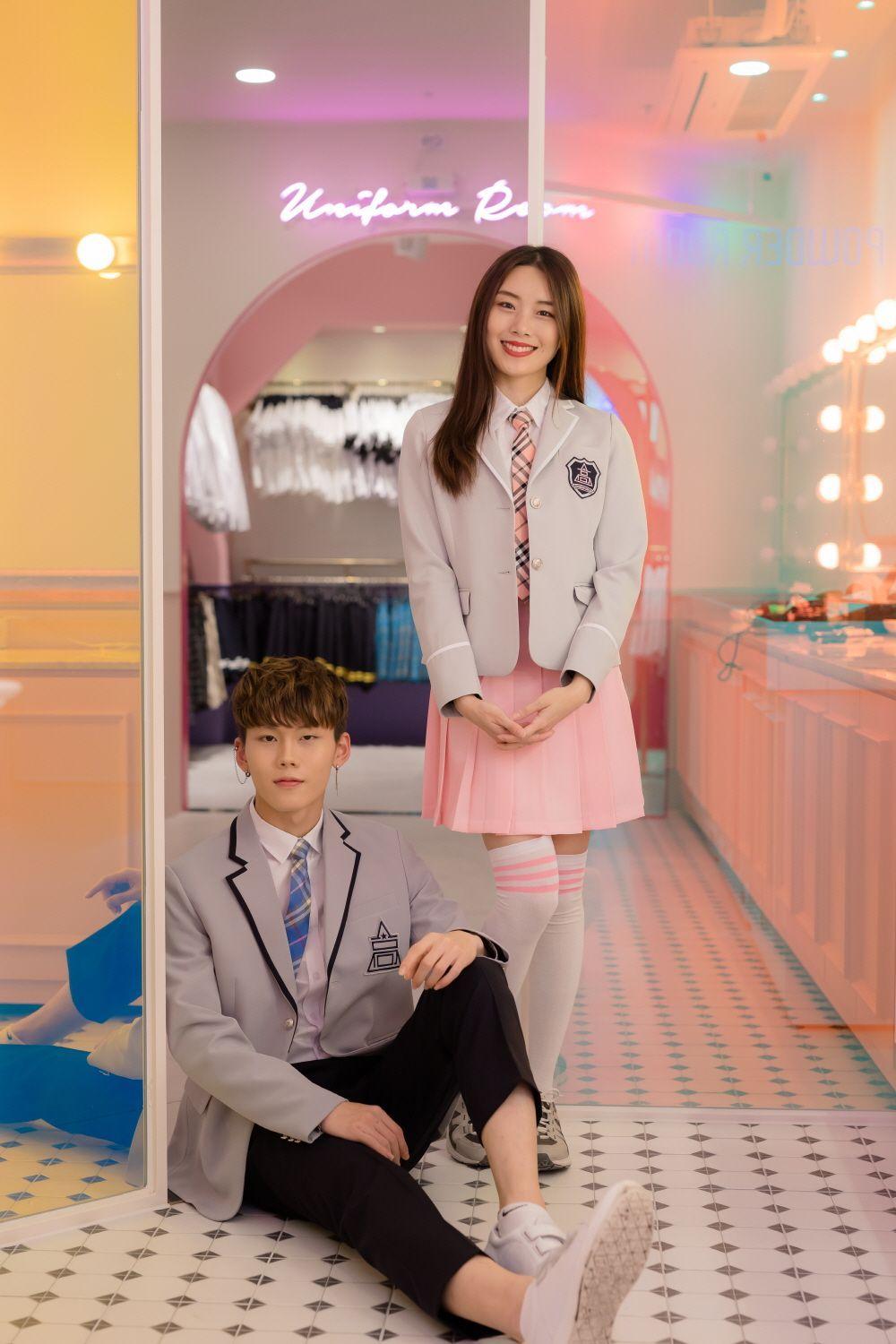 Neatly arranged collection of school uniform vests and skirts in various colors and styles at Ehwa School Uniform, offering a modern twist on traditional designs.