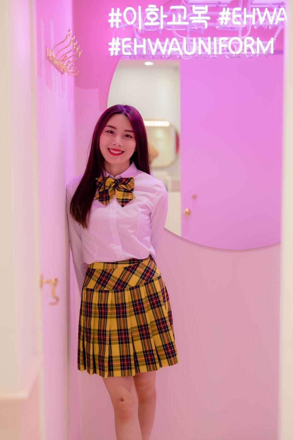 Diverse range of trendy school skirts and shirts available for rent at Ehwa School Uniform, displayed in a vibrant shop interior.