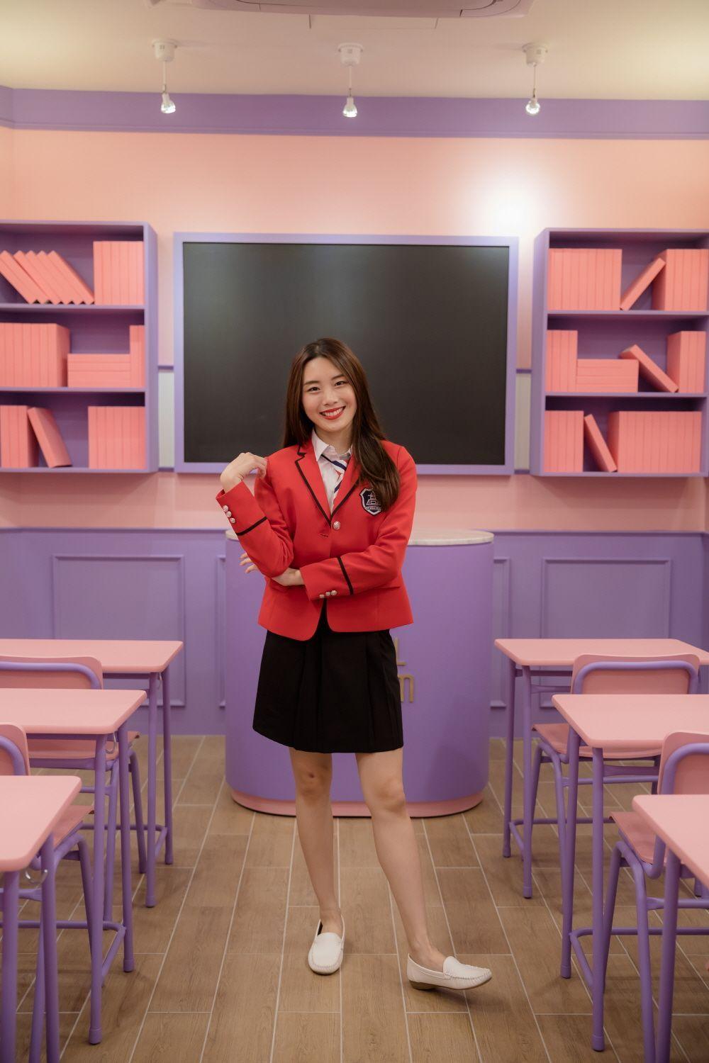 Ehwa School Uniform display rack featuring a collection of traditional and contemporary school uniforms for visitors to rent and experience.