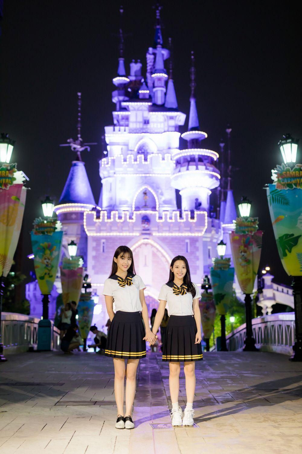A fashionable display of school uniforms at Ehwa School Uniform, including stylish plaid skirts and coordinated tops and vests.