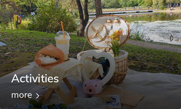 Two cups of coffee with cake slices in a cozy cafe setting near Konkuk University, Seoul.