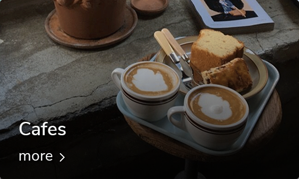 A colorful pizza with various toppings, served at a restaurant in Kondae, Seoul.