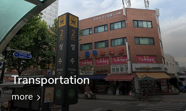 Shopping area near Konkuk University, showcasing vibrant evening market with hanging lights.