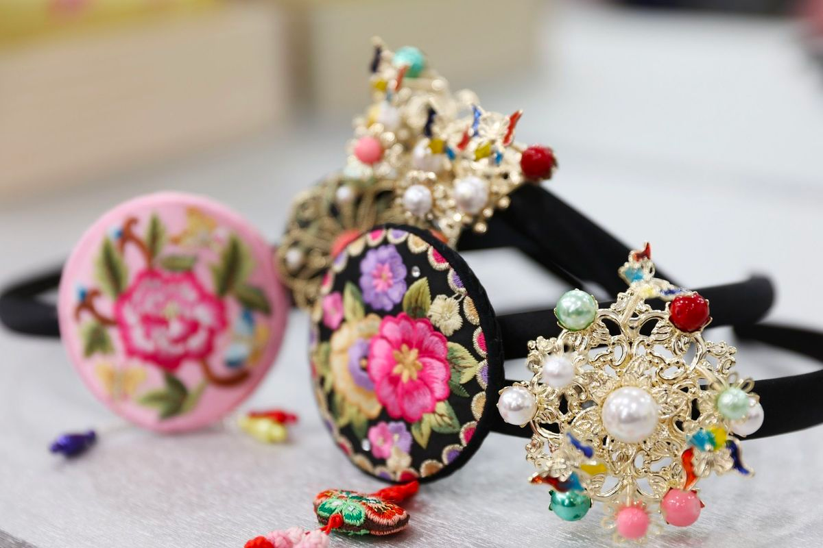 Selection of hanbok styles available at Hanbok Girls rental store near Gyeongbokgung Palace, showcasing the elegance and tradition of authentic Korean clothing.