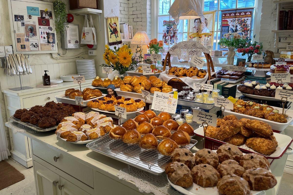 Dessert display at Cafe Layered in Yeonnam-dong with a variety of baked goods and a beautifully arranged table of pastries.