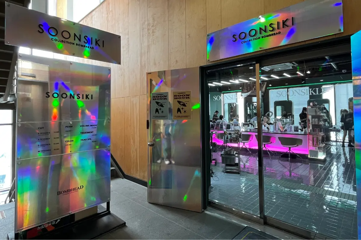 Entrance of Soonsiki Hair in Hongdae showcasing the salon's trendy and welcoming design.