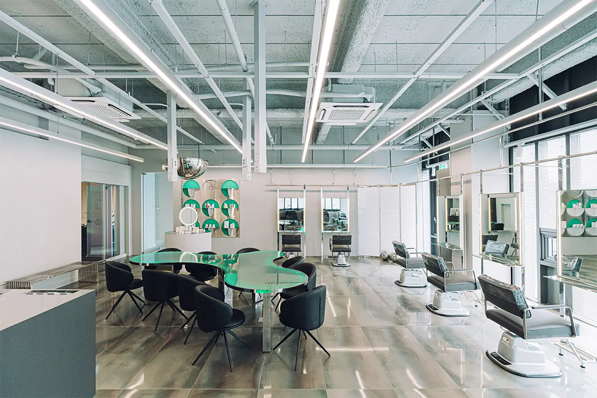 Modern salon entrance with branding, welcoming customers at Soonsiki Hair Hongdae.