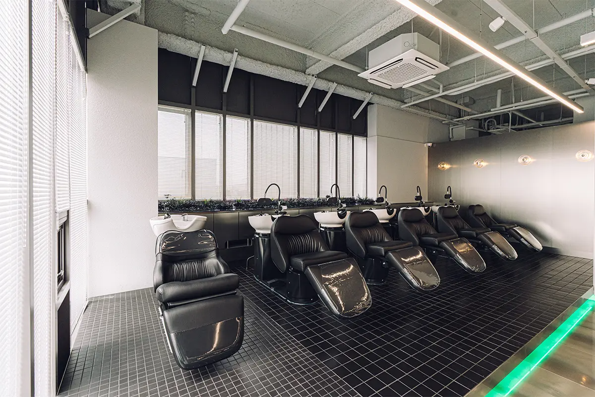 Stylishly designed interior at Soonsiki Hair Hongdae showcasing trendy amenities.