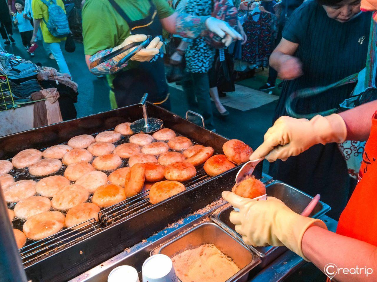 Evening vibes at Seomun Market, bustling with vendors and visitors.