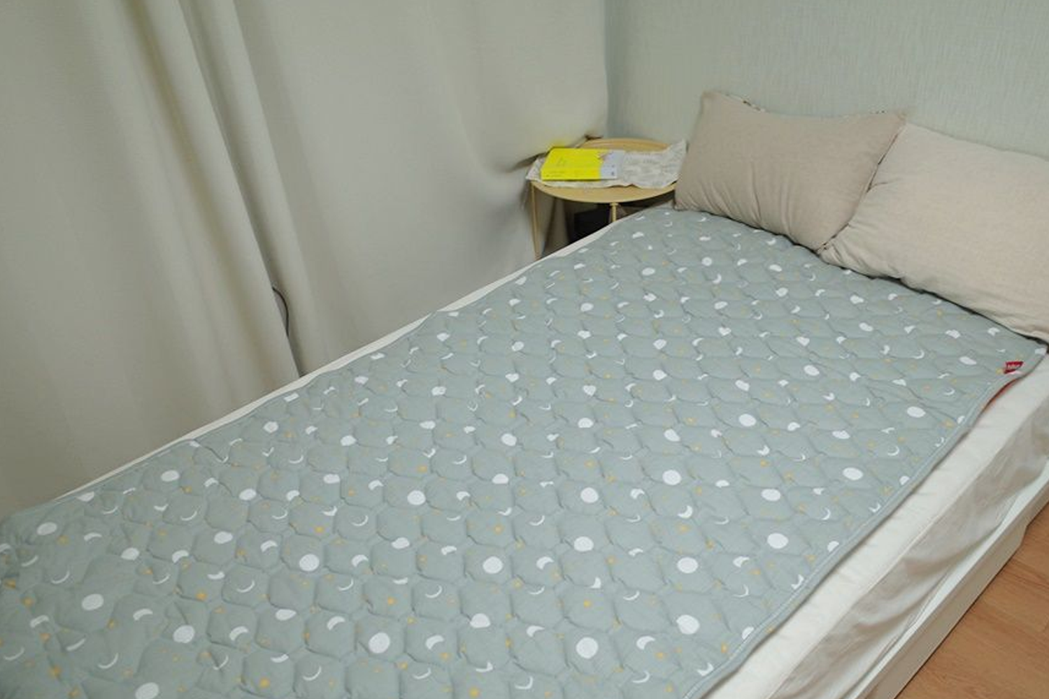 Electric blanket laid out on a bed, a great item during the winter monhts