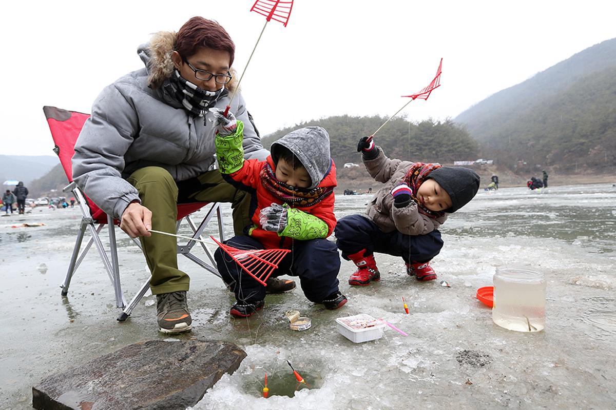 Winter Activities In Korea: family ice fishing