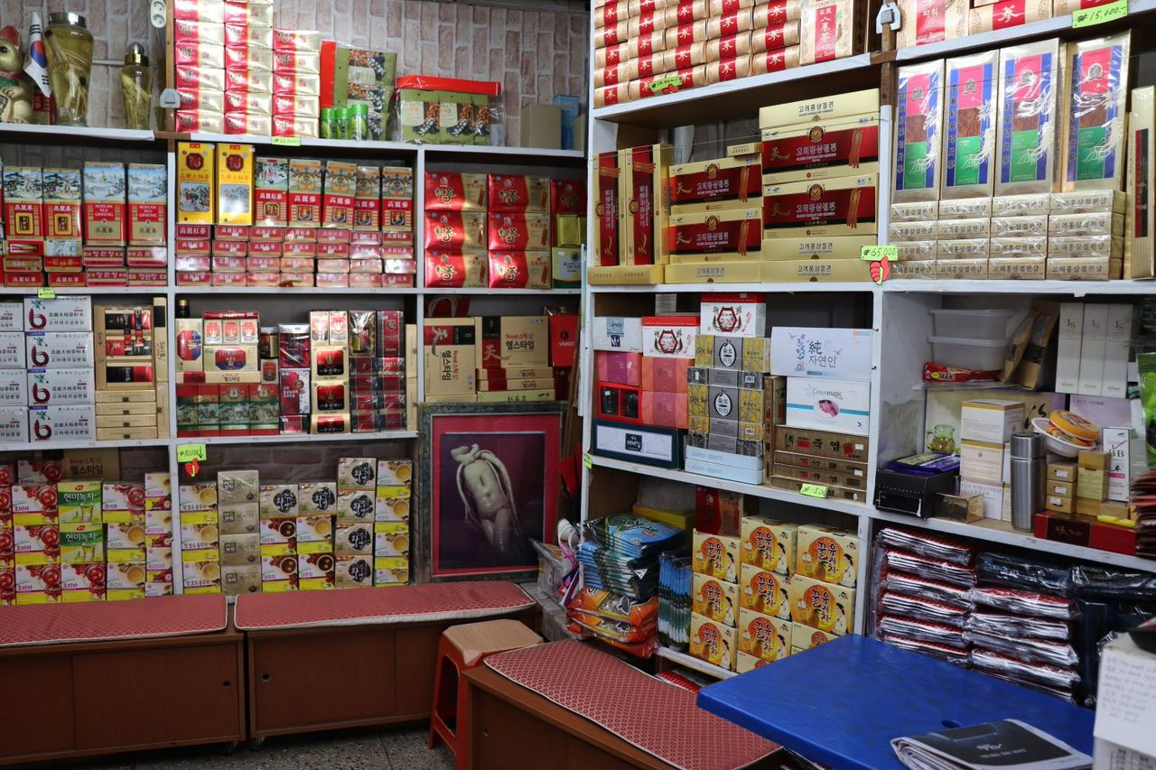 Interior view of Jangan Store featuring various Korean goods, including ginseng and herbal teas.