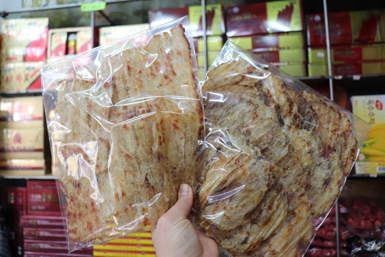 Two varieties of dried fish packaged and ready for sale at Jangan Store in Namdaemun Market.
