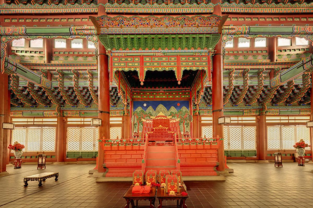 Interior of Gyeonghuigung Palace in Seoul showcasing traditional Korean decor and vibrant colors.