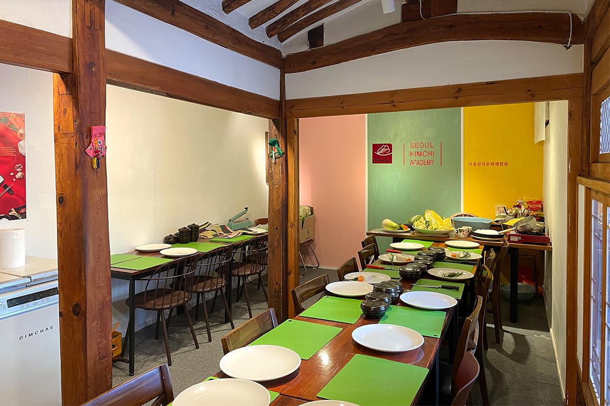 Walking path leading to the Seoul Kimchi Academy in a traditional Korean neighborhood.