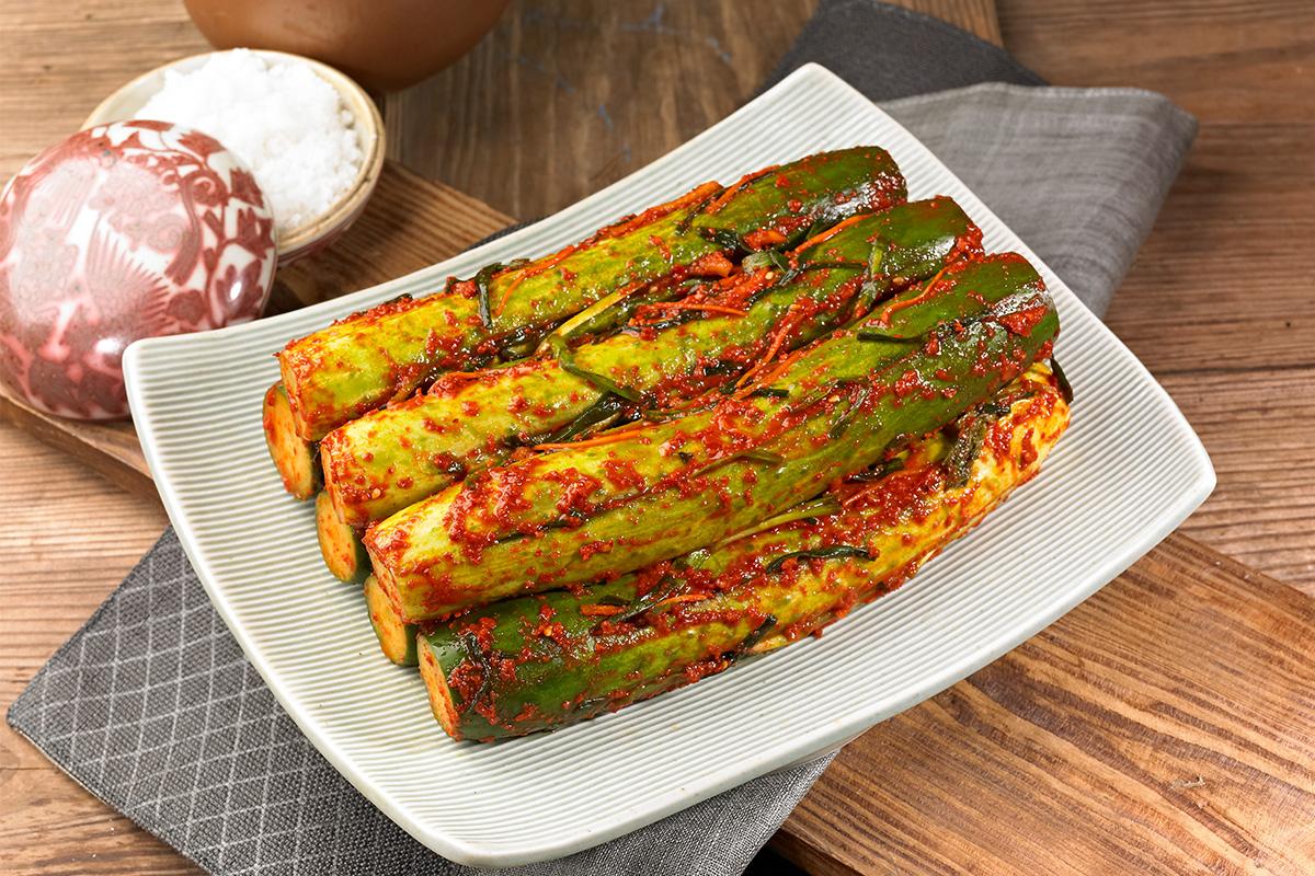 Finished kimchi from a class at Seoul Kimchi Academy, packaged for takeaway in vacuum-sealed bags.