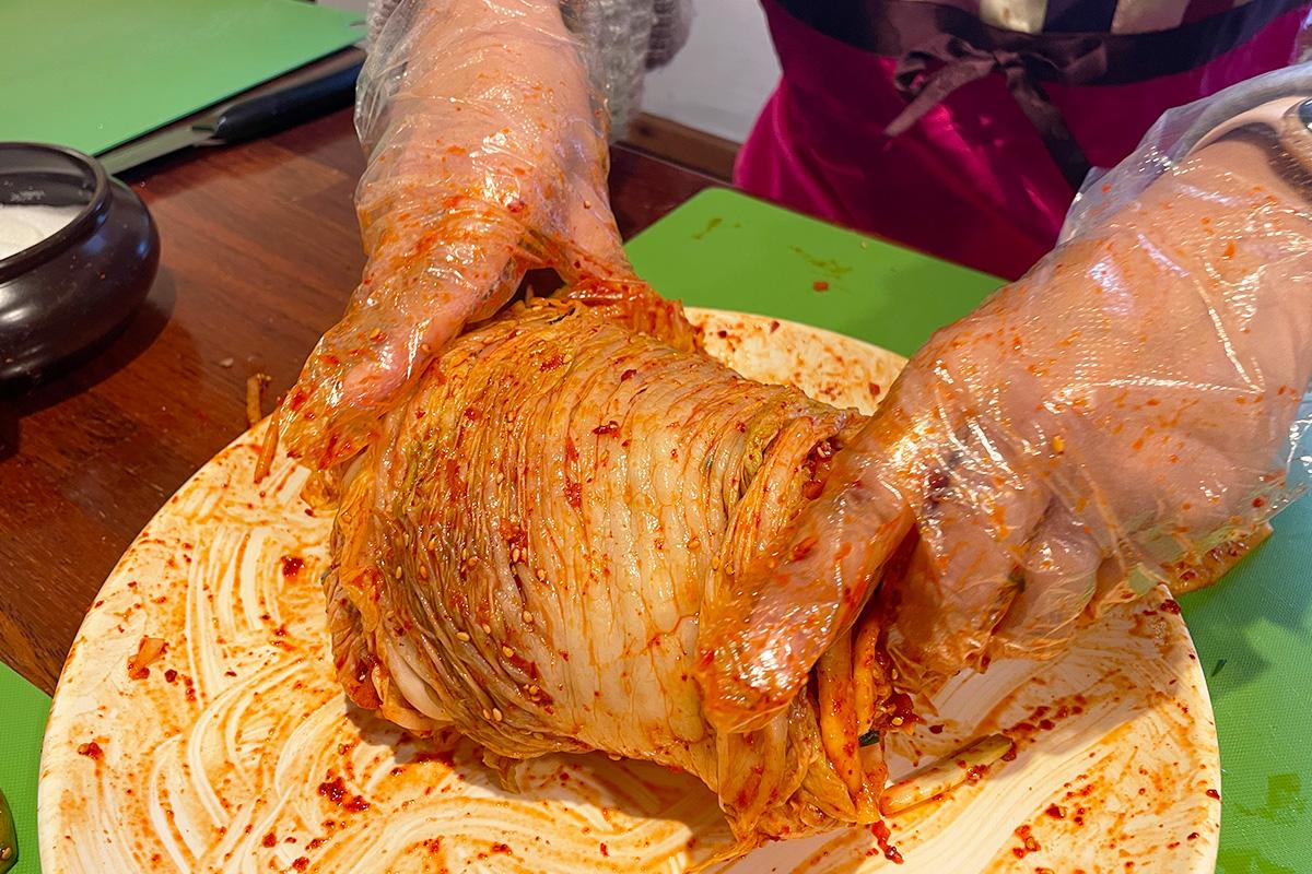 Rolled kimchi after seasoning, a finished product from the kimchi-making class experience.