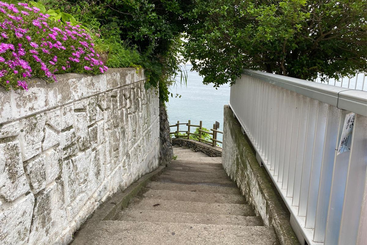 Scenic stairs with ocean backdrop in Huinnyeoul Culture Village