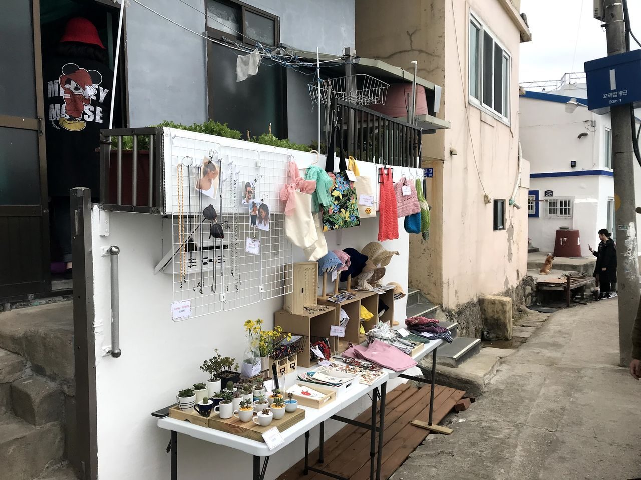 Alley way with items for sale in Huinnyeoul Culture Village