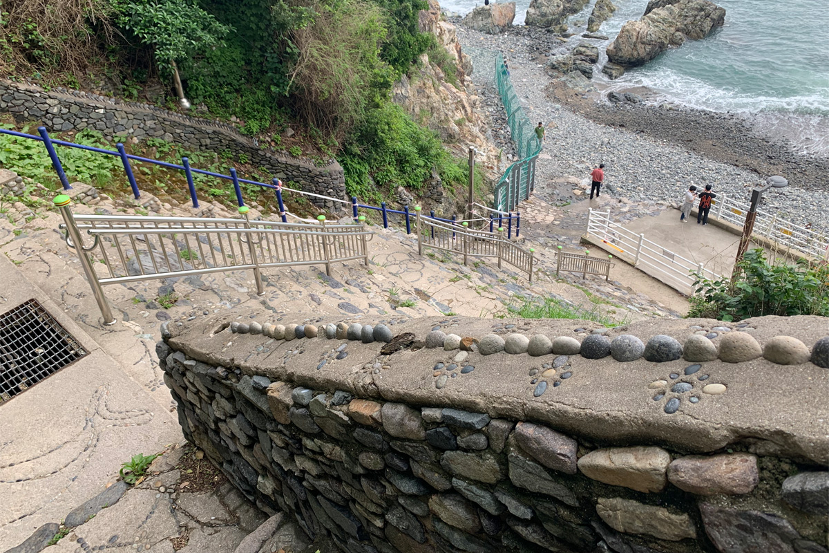 Steep stone stairs in Huinnyeoul Culture Village