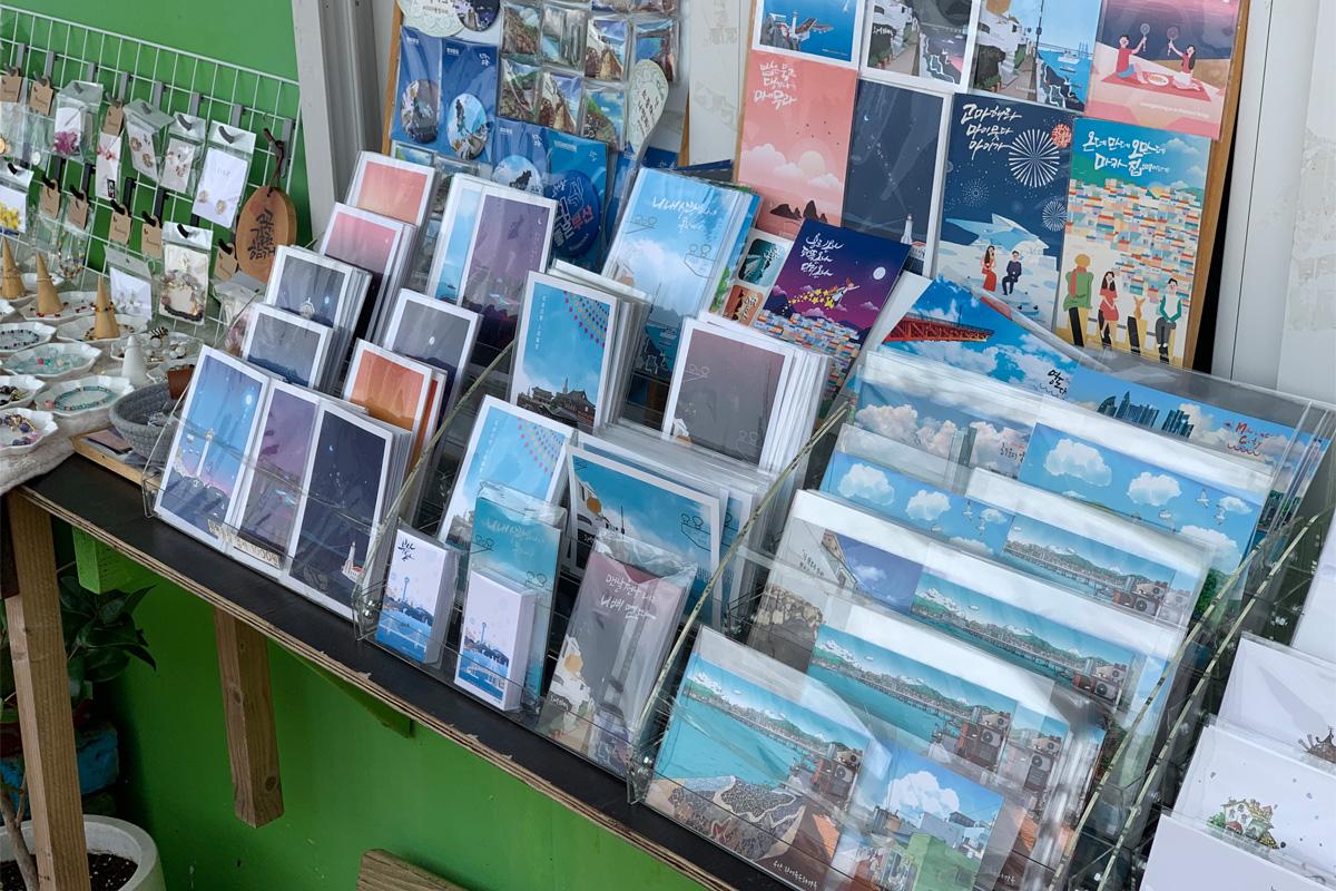 postcards at a shop in Huinnyeoul Culture Village