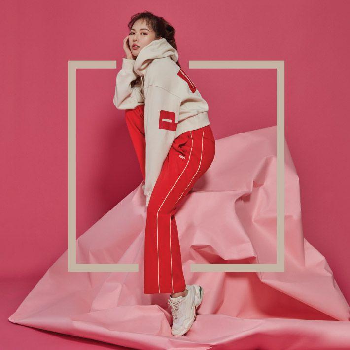 鮮紅色PUMA運動套裝展示，風格活潑且充滿動感魅力的運動服飾。