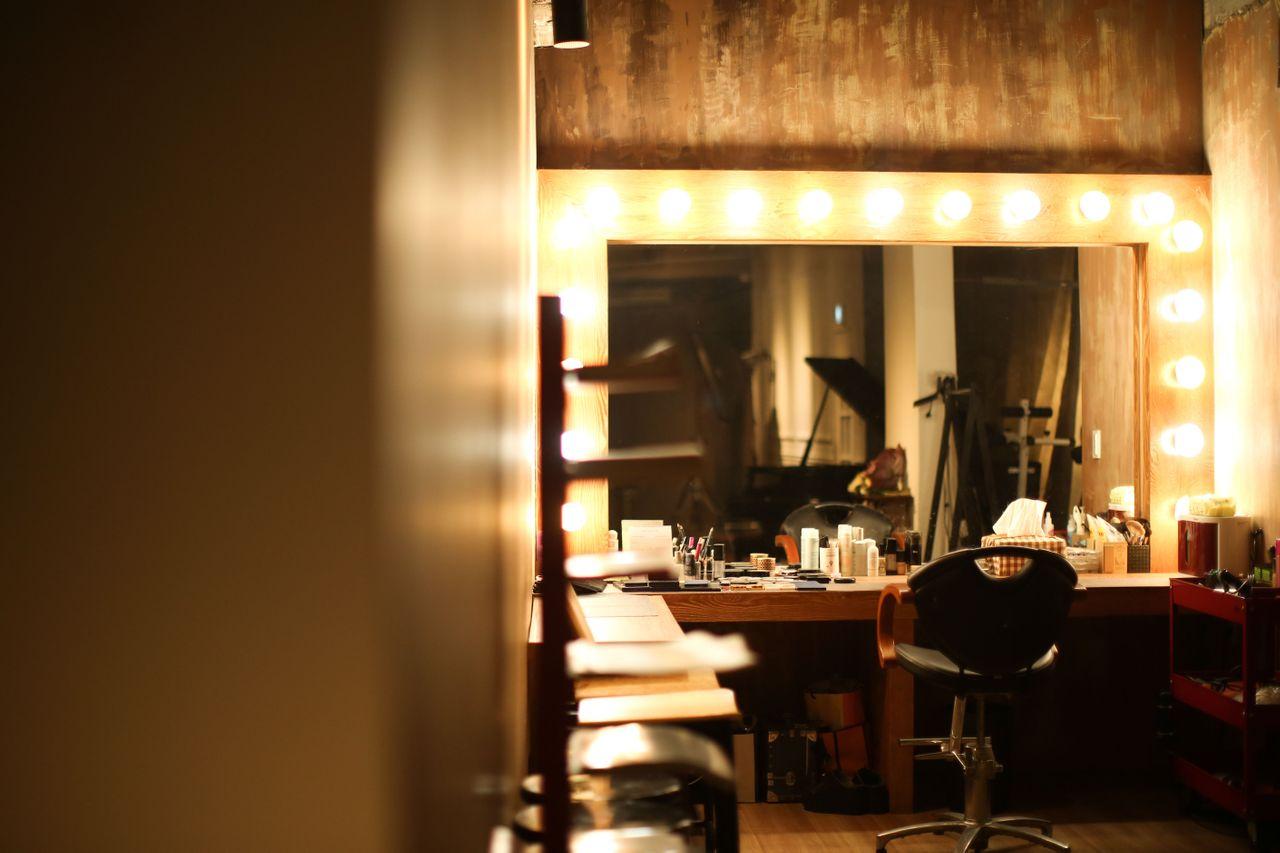 Wedding dresses and elegant outfits on display, offering a variety of styles for brides at Time On Me Studio.