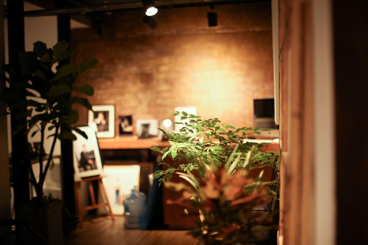 Computer screen displaying a wedding photo editing session, showing the meticulous attention to detail at Time On Me Studio.