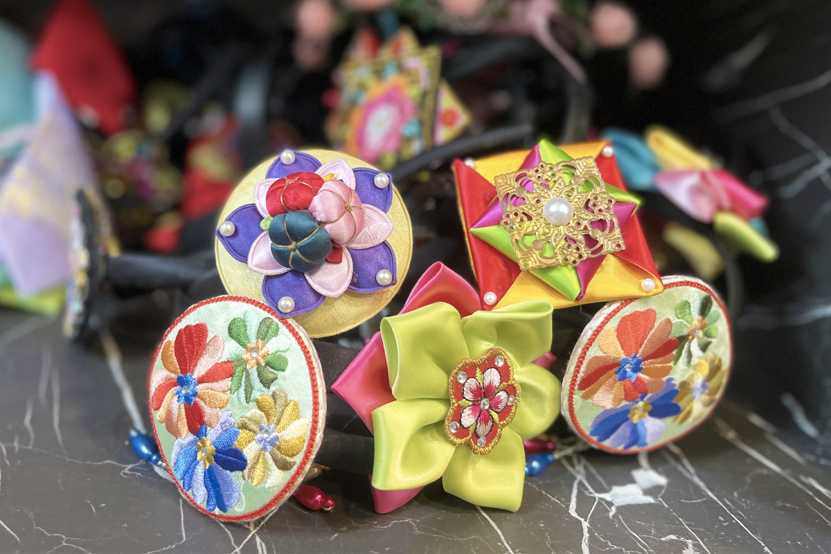 An image displaying intricate hair accessories available at Princess Hanbok, augmenting hanbok rentals with authentic, traditional Korean adornments.