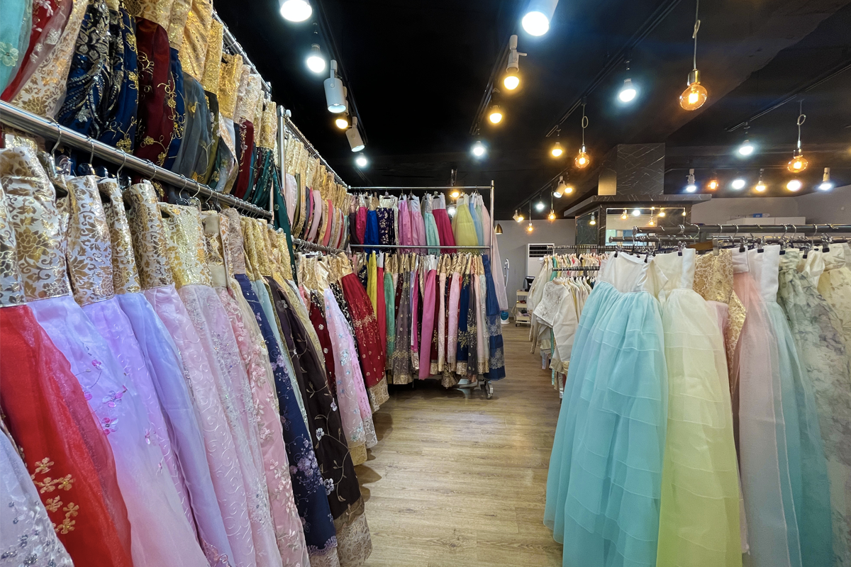 A close-up of beautiful hanbok fabrics with exquisite details and embroidery, illustrating the craftsmanship and vibrant designs available at Princess Hanbok store.