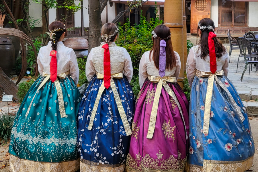Premium hanbok displayed in Princess Hanbok rental shop, featuring luxurious embroidery and traditional Korean design elements.