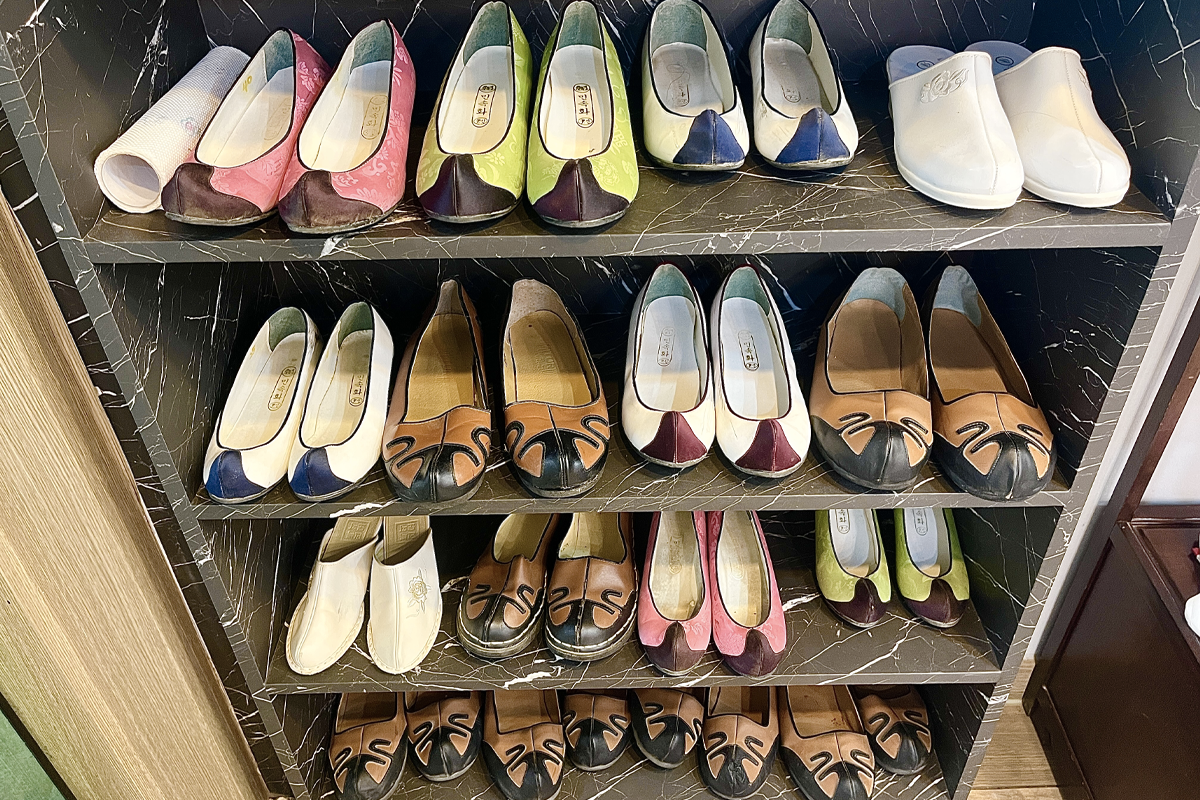 A selection of traditional shoes at Princess Hanbok, perfect for accessorizing a rental hanbok outfit and completing the traditional Korean attire.