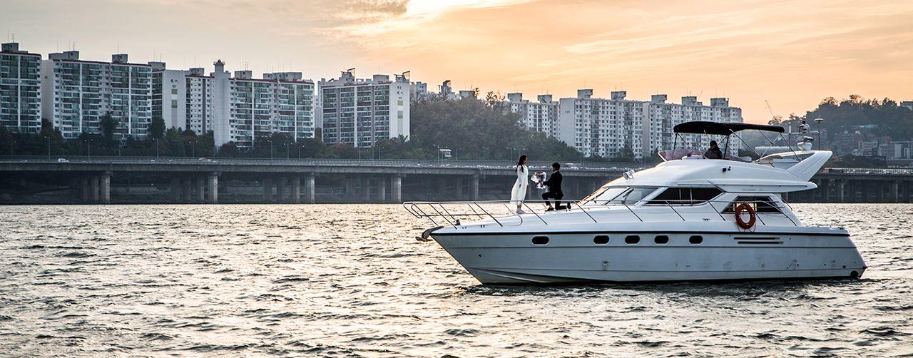 Interior of a Power Yacht II on the Han River with modern amenities and luxurious seating for passengers.