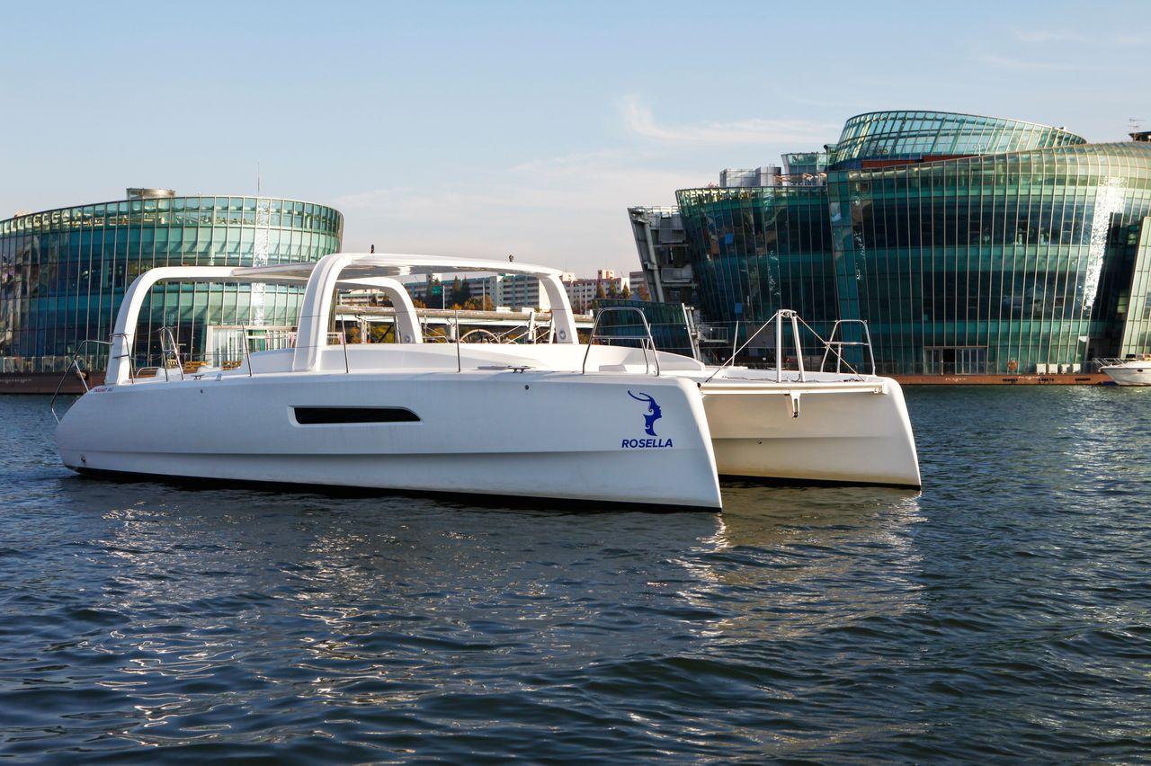 Catamaran Yacht cruising on the Han River in Seoul, offering a unique and spacious platform for enjoying the scenery.