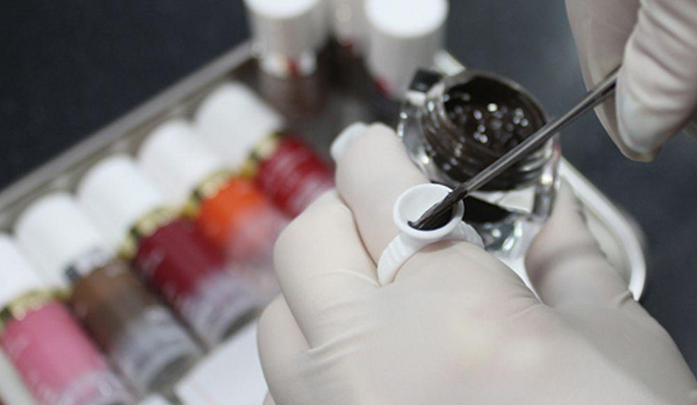 Close-up of the semi-permanent eyebrow procedure being performed at Juliet Beauty in Busan.