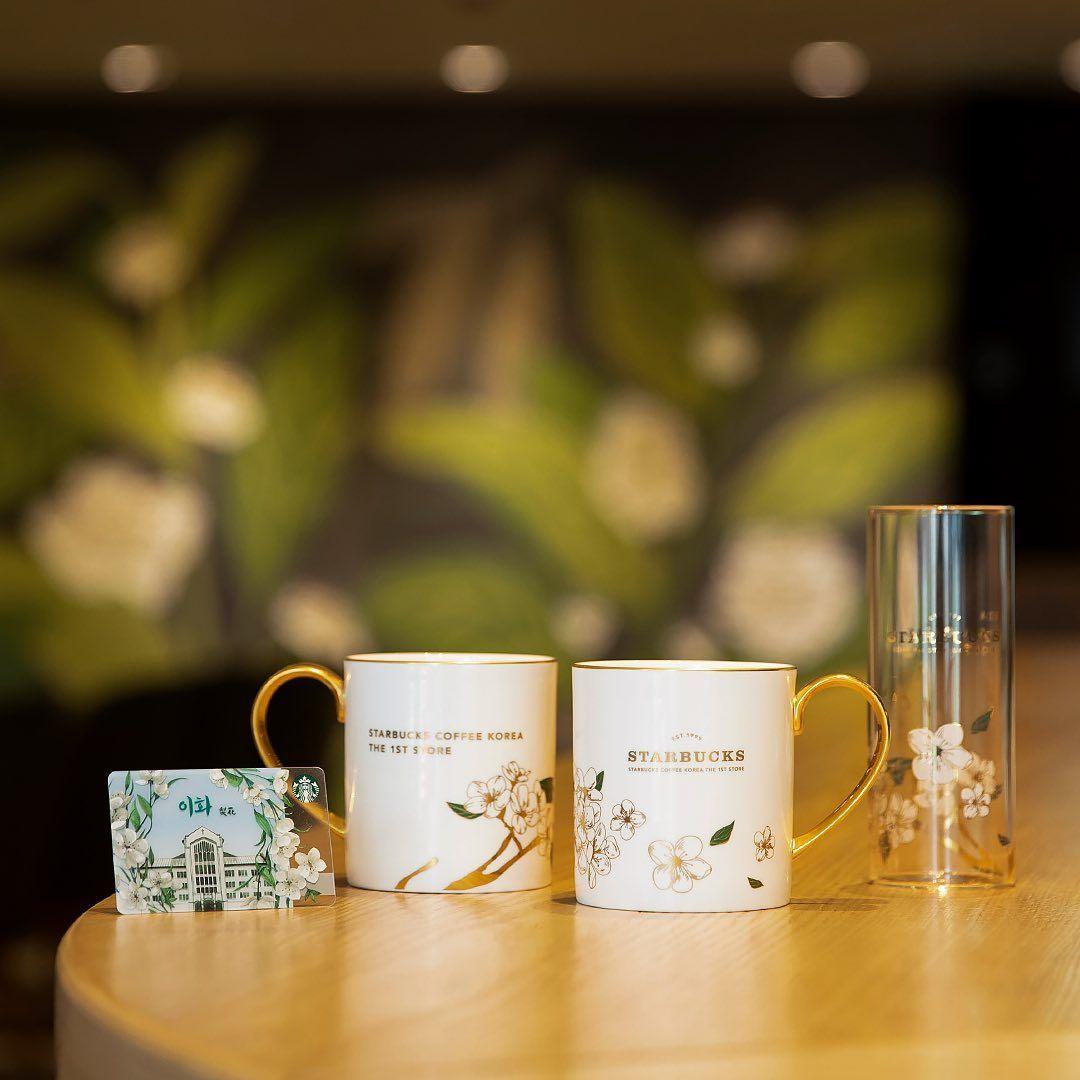 Special edition Starbucks mug and card featuring the Ehwa pear flower design, only available at the pioneer store.