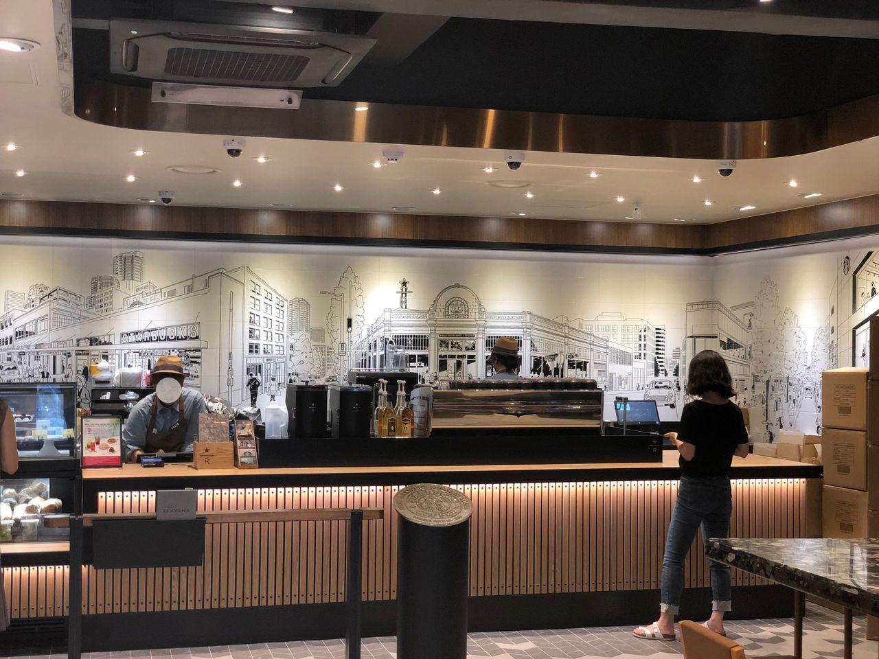 Artistic drawing within Starbucks Korea’s interior, creating a cozy ambience.