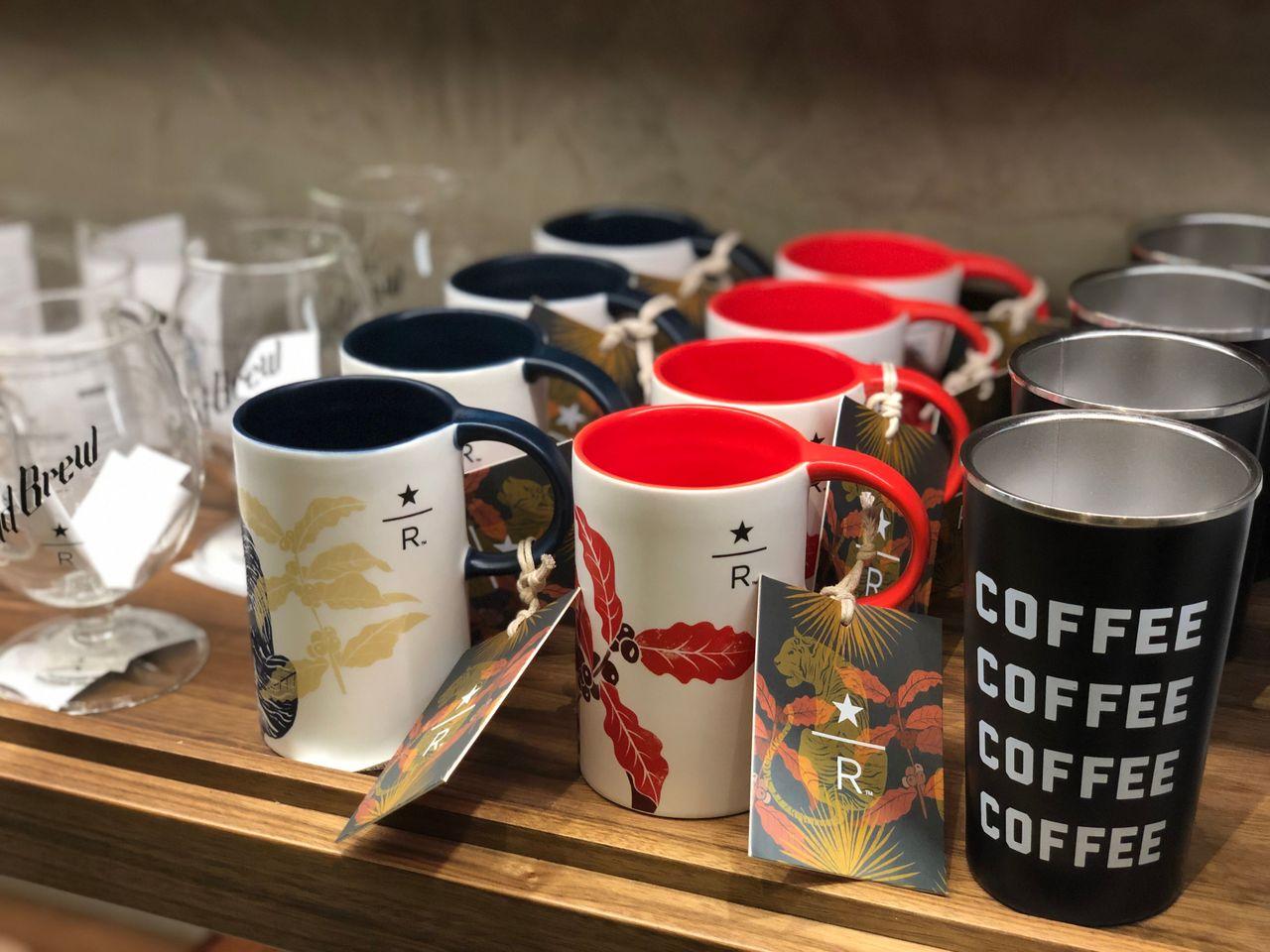 Selection of colorful Starbucks travel cups available at the Reserve store in Korea.