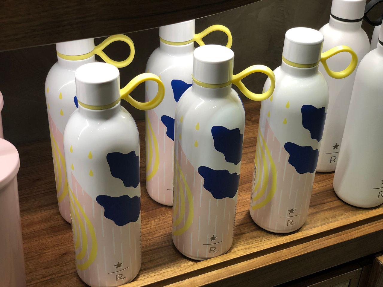 Display of unique Starbucks mugs featuring different designs at the first Korea store.