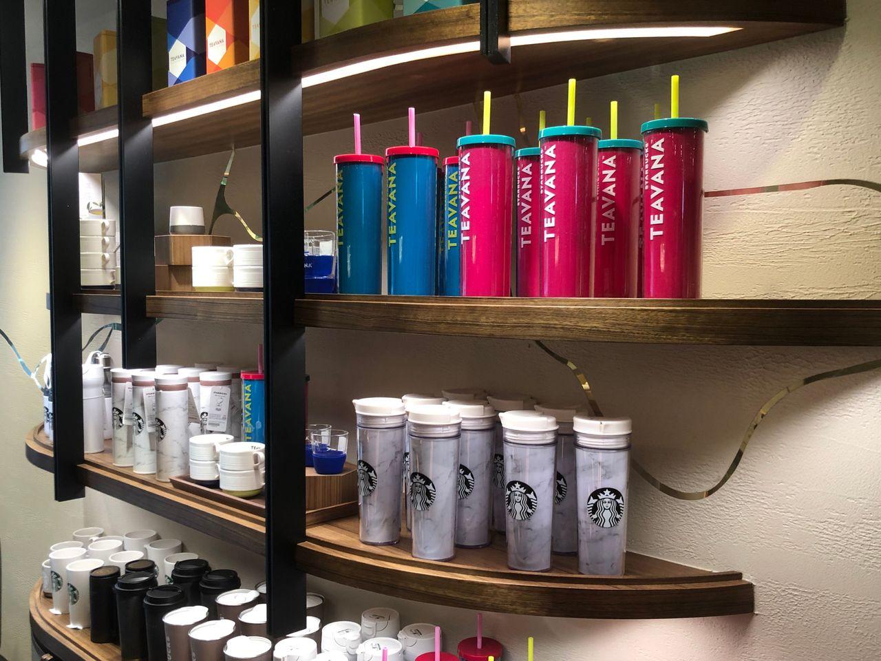 Starbucks Reserve chill zone; patrons relax with drinks and snacks at Korea’s first store.