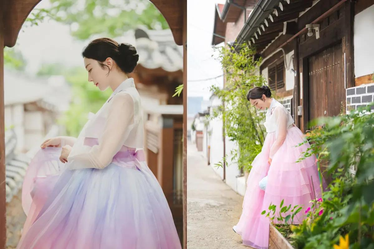 Outdoor photoshoot displaying the elegance of traditional Korean hanbok.