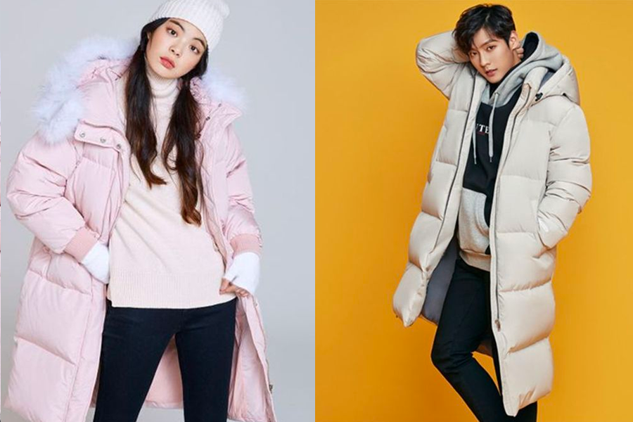 粉紅色的蓬鬆長羽絨大衣令女性看起來舒適暖和，一名男性則穿著灰白色的輕便羽絨外套。這些是適合寒冷天氣的時尚款式。