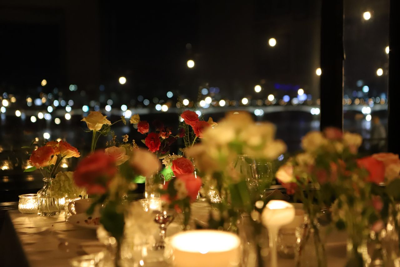 Romantic candlelit dinner setting at I.O.U Restaurant in Seoul, ideal for special occasions.