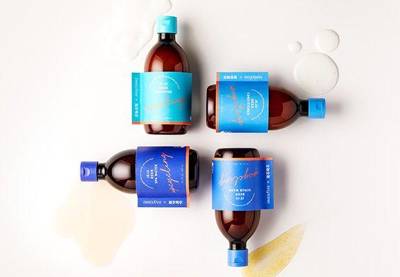 innisfree 濟州啤酒設計的瓶裝洗浴產品，展示與其他護髮用品的獨特結合。