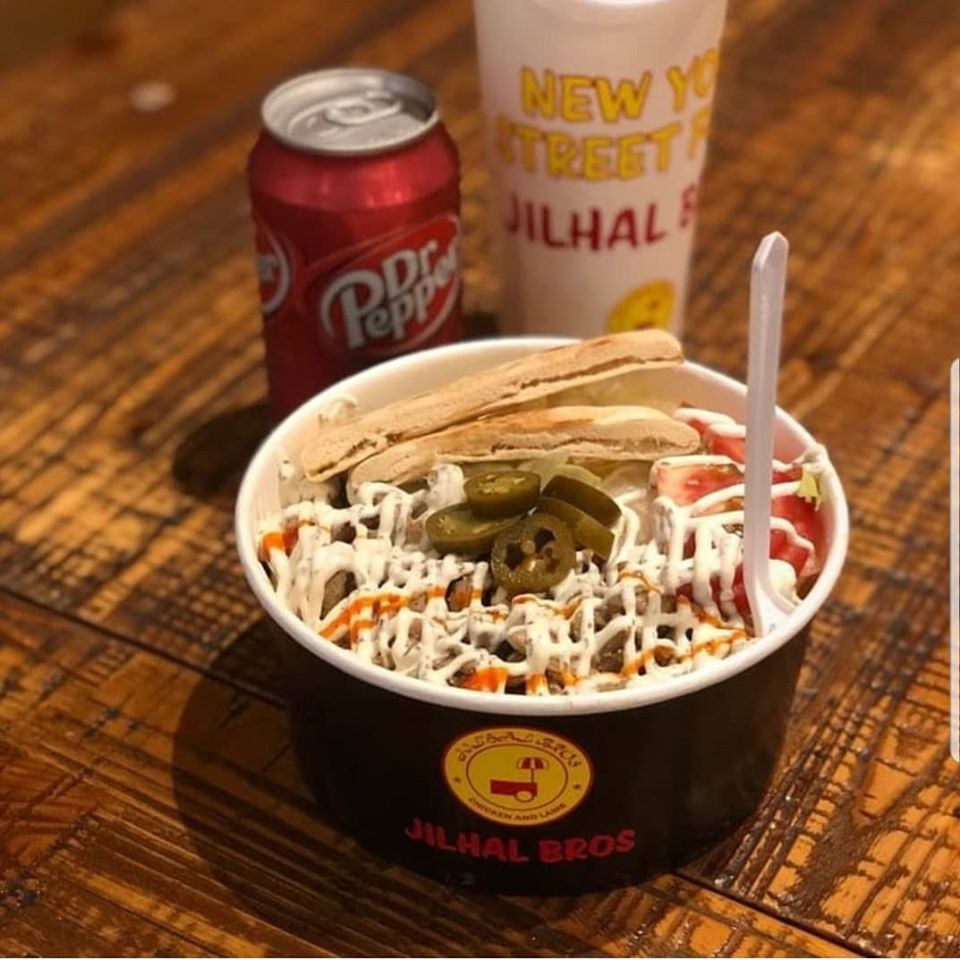 GOT7 멤버들이 Jilhal Bros에서 식사하는 모습으로, 편안한 분위기가 느껴집니다.