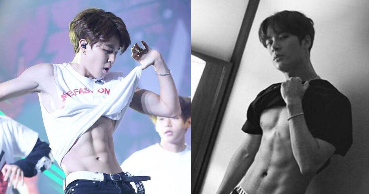 ไอดอลชายเกาหลีกับร่างกายที่มีซิกแพคและกล้ามเนื้อที่เด่นชัดในระหว่างการแสดงบนเวที