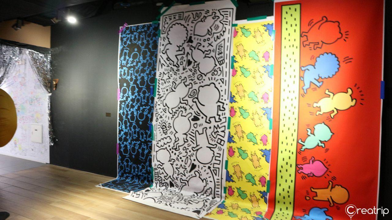 Colorful wall art and interactive design features showcasing Kakao Friends icons.